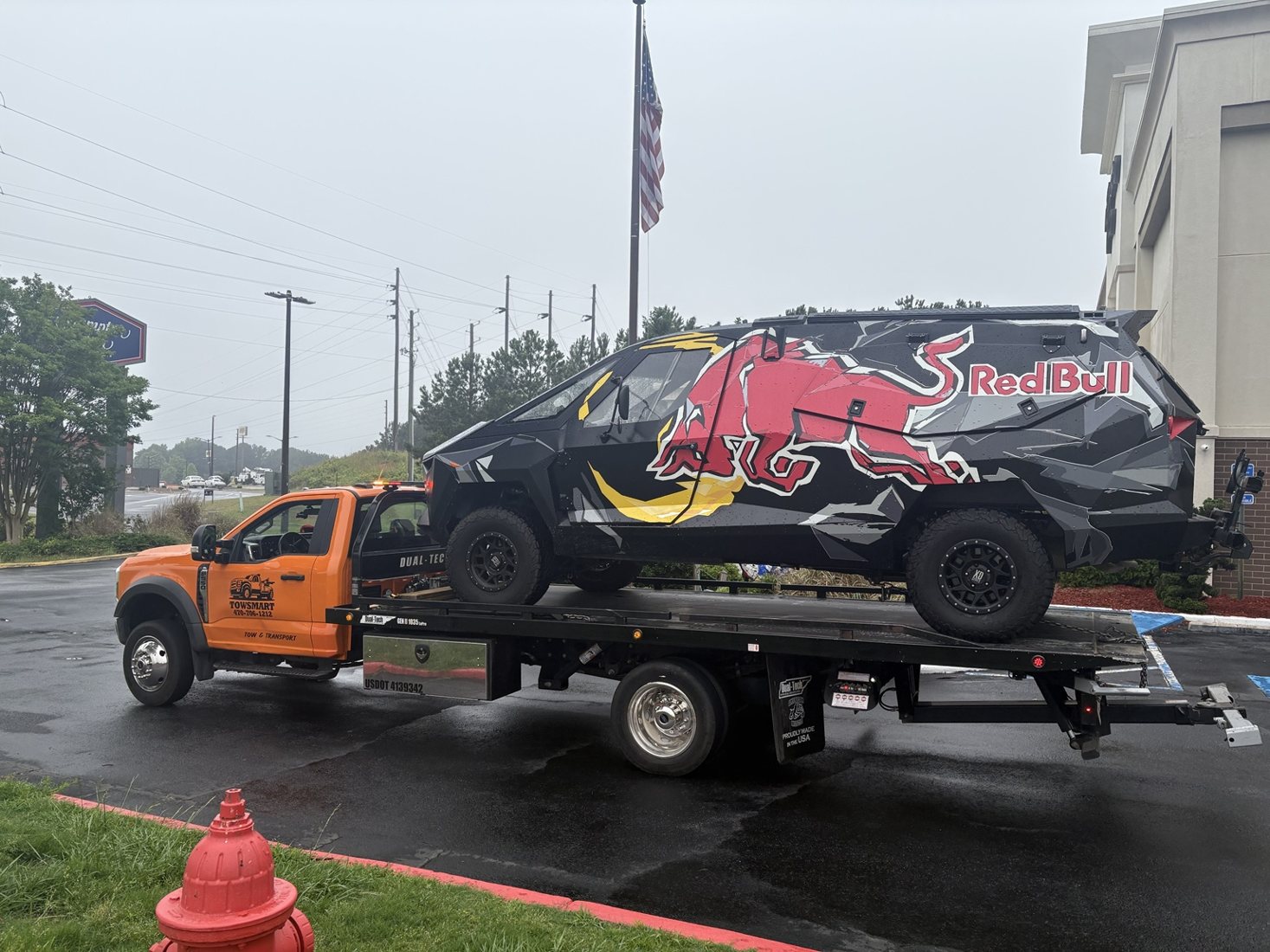 TowSmart transporting a large specialty vehicle